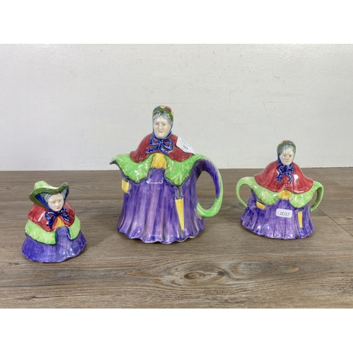 296 - A mid 20th century hand painted ceramic novelty lady three piece teaset - made in England