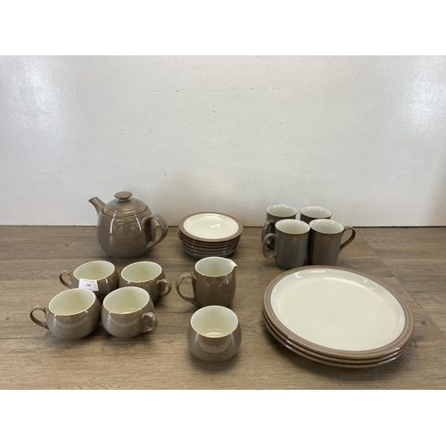 286 - A collection of Denby Greystone pottery to include four teacups, three saucers, teapot, sugar bowl, ... 