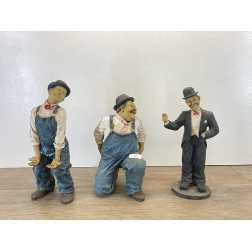 290 - Three resin Laurel and Hardy figurines