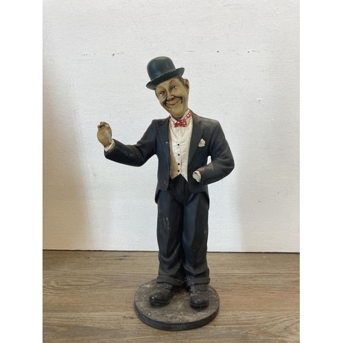 290 - Three resin Laurel and Hardy figurines