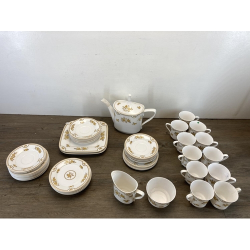 294 - A collection of Spode Austen bone China to include eleven cups, fifteen saucers, teapot etc.