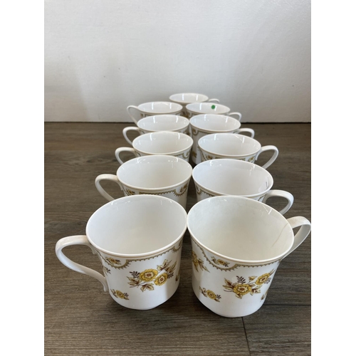 294 - A collection of Spode Austen bone China to include eleven cups, fifteen saucers, teapot etc.