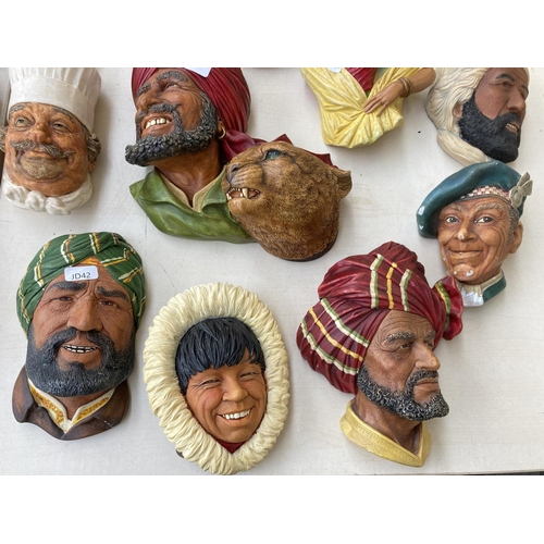 317A - Twenty three Bossons and Naturecraft hand painted chalkware wall masks to include Deccan Hunters, Jo... 