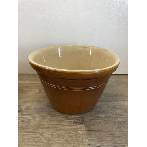 319 - Four salt glazed stoneware dairy bowls - largest approx. 26cm diameter