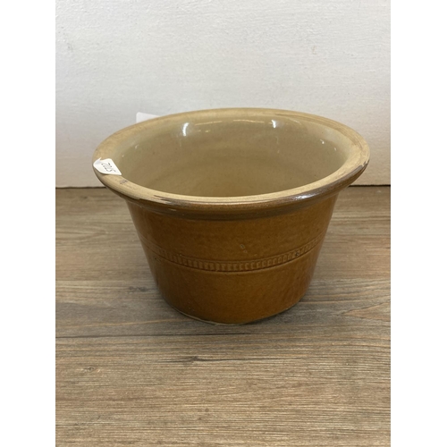 319 - Four salt glazed stoneware dairy bowls - largest approx. 26cm diameter