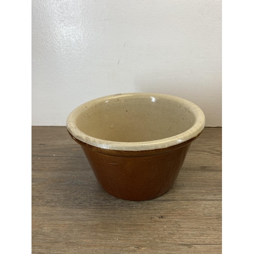 319 - Four salt glazed stoneware dairy bowls - largest approx. 26cm diameter