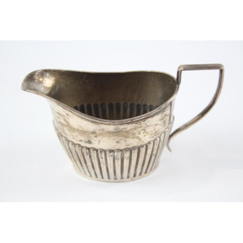 2293 - A William Devenport hallmarked Birmingham sterling silver cream jug, dated 1903 - approx. 6.6cm high... 