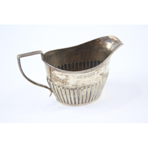 2293 - A William Devenport hallmarked Birmingham sterling silver cream jug, dated 1903 - approx. 6.6cm high... 