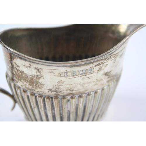 2293 - A William Devenport hallmarked Birmingham sterling silver cream jug, dated 1903 - approx. 6.6cm high... 