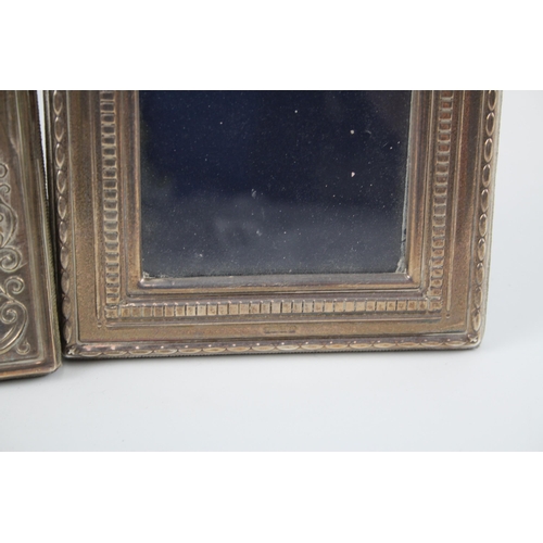 2294 - Two hallmarked sterling silver photo frames - approx. gross weight 647g