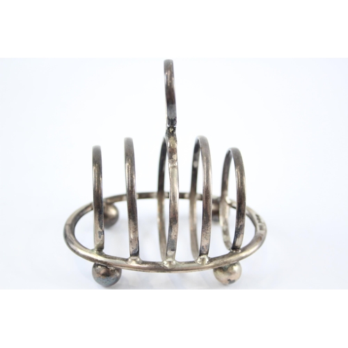 2300 - A George V Walker & Hall hallmarked Sheffield silver five bar toast rack, dated 1919 - approx. gross... 