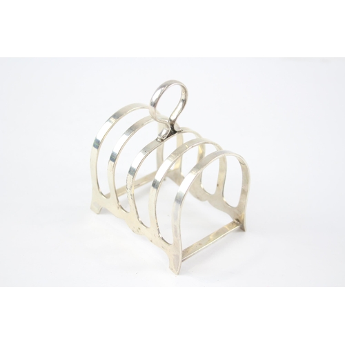 2302 - A Walker & Hall hallmarked Sheffield sterling silver five bar toast rack, dated 1955 - approx.7.6cm ... 