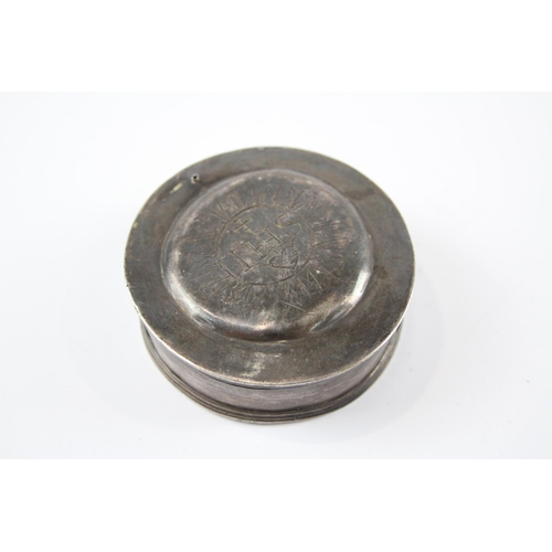 2308 - An antique .950 silver engraved trinket box - approx. 6.1cm diameter and 65g