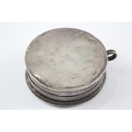 2308 - An antique .950 silver engraved trinket box - approx. 6.1cm diameter and 65g