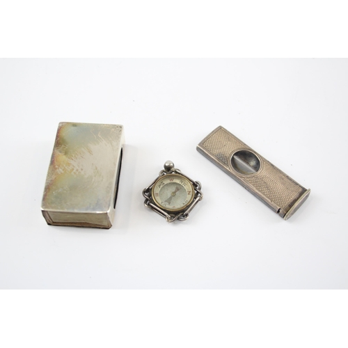 2313 - Three pieces of hallmarked sterling silver, one cigar cutter, one match holder and one compass - app... 