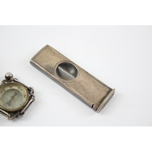 2313 - Three pieces of hallmarked sterling silver, one cigar cutter, one match holder and one compass - app... 