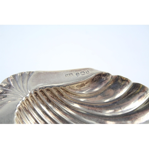 2316 - An Atkin Bros hallmarked Sheffield silver scallop dish - approx. gross weight 61g