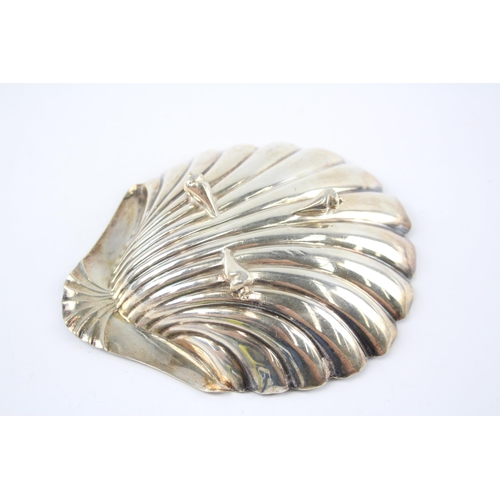 2316 - An Atkin Bros hallmarked Sheffield silver scallop dish - approx. gross weight 61g