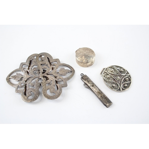 2321 - Four antique hallmarked sterling silver items to include foliate etched pill box, belt buckle etc. -... 