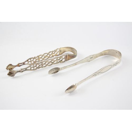 2336 - Two pairs of antique hallmarked sterling silver sugar tongs - approx. gross weight 65g