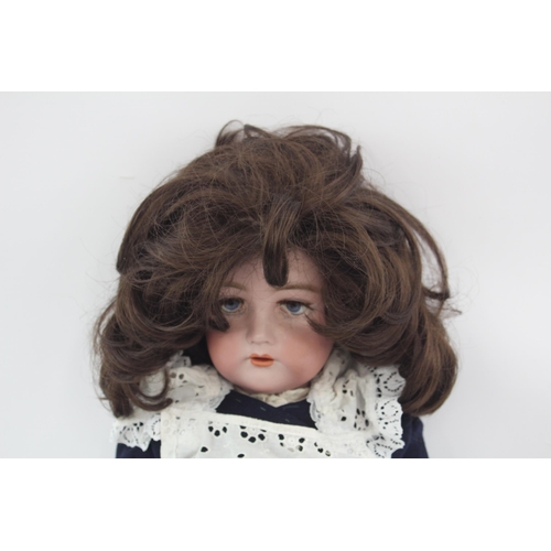 362 - A Simon & Halbig/Kammer & Reinhardt bisque porcelain and composite doll - no. 66