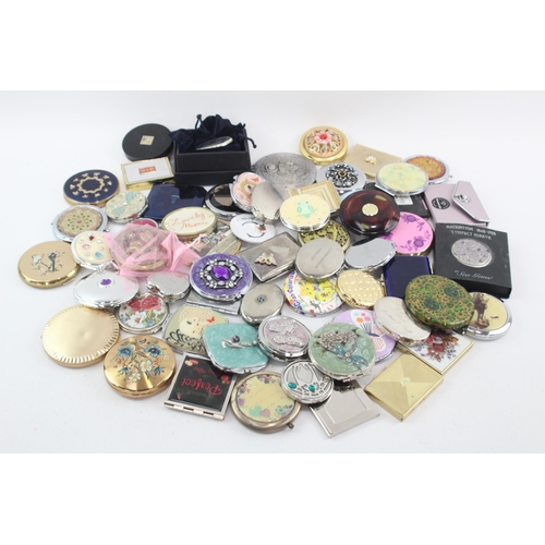 481 - A large collection of women's mirrors and compacts