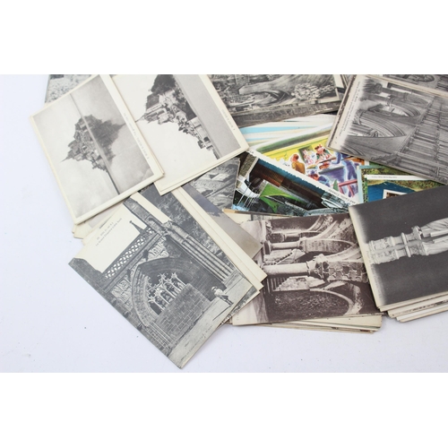 522 - A collection of antique and later postcards