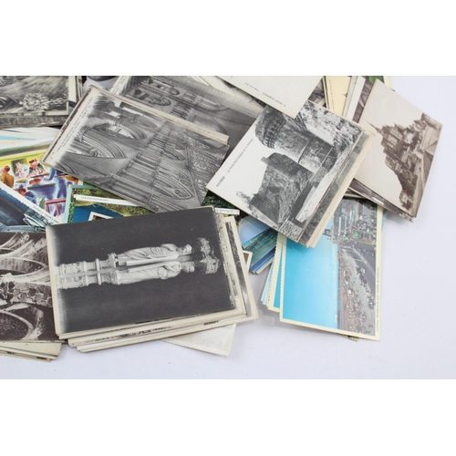 522 - A collection of antique and later postcards