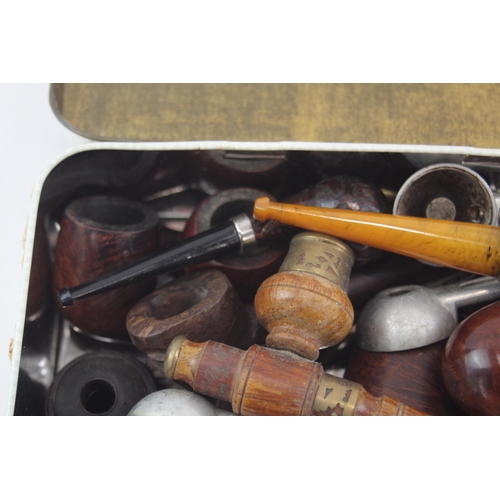 525 - A collection of vintage smoking pipes to include Darvill Real Briar, Falcon etc.