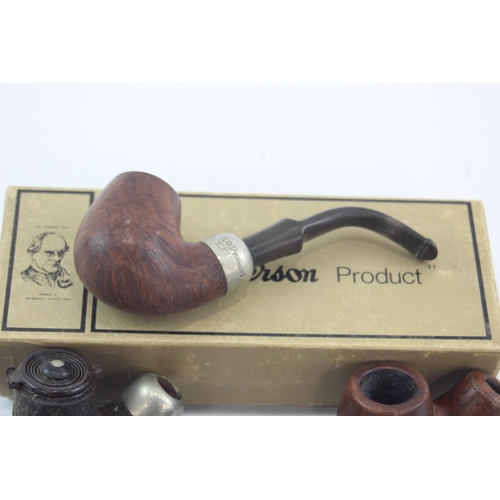 526 - Seven vintage smoking pipes and bowls to include K & P Peterson's etc.