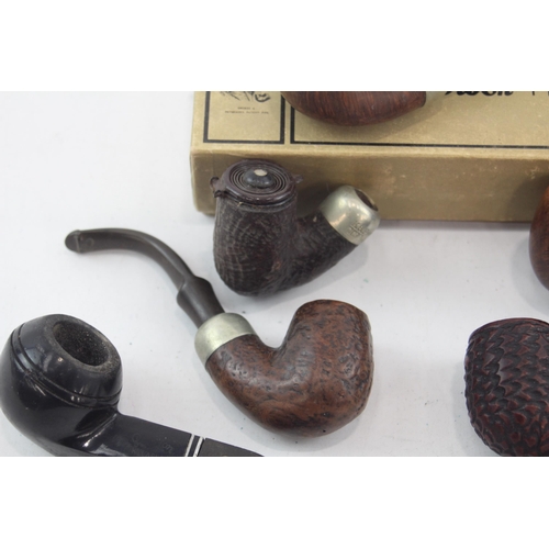 526 - Seven vintage smoking pipes and bowls to include K & P Peterson's etc.