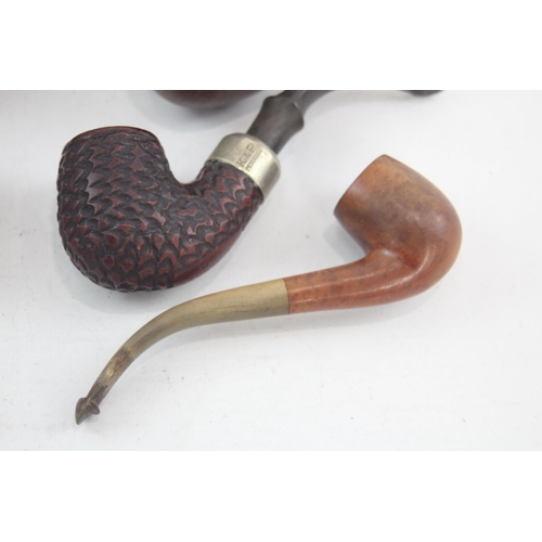 526 - Seven vintage smoking pipes and bowls to include K & P Peterson's etc.