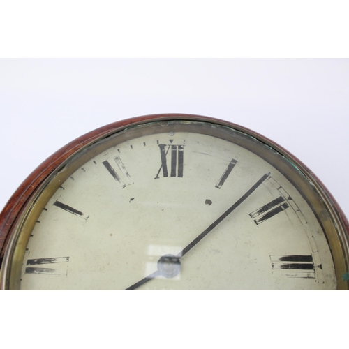 558 - A late 19th/early 20th century mahogany cased circular wall clock with enamel face - approx. 39cm di... 