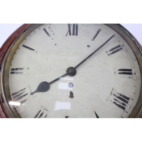 558 - A late 19th/early 20th century mahogany cased circular wall clock with enamel face - approx. 39cm di... 