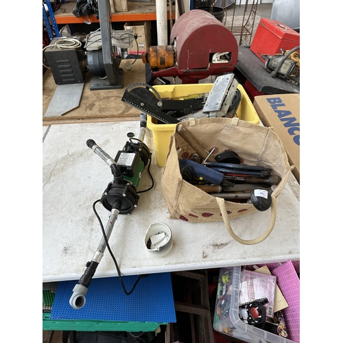 856 - A collection of tools to include pair of cast metal G-clamps, 240v Salamander pump, mallets and hamm... 