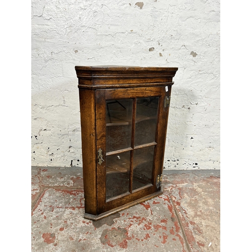 102 - A Titchmarsh & Goodwin style oak wall mountable corner cabinet - approx. 70cm high x 50cm wide x 29c... 