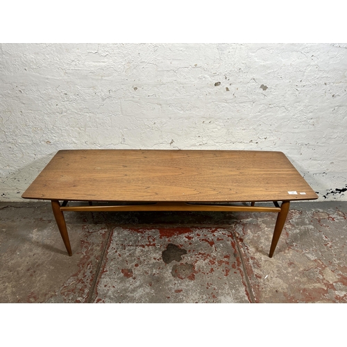 108 - A mid 20th century teak coffee table - approx. 40cm high x 50cm wide x 131cm long