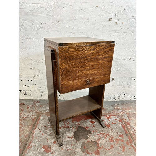 109 - An Art Deco oak sewing table - approx. 65cm high x 39cm wide x 29cm deep