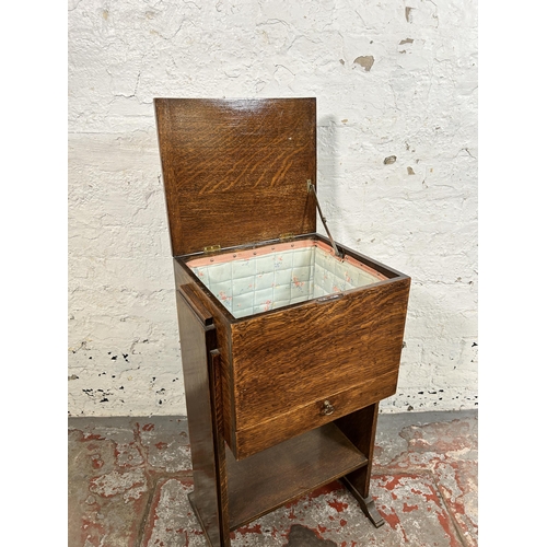 109 - An Art Deco oak sewing table - approx. 65cm high x 39cm wide x 29cm deep