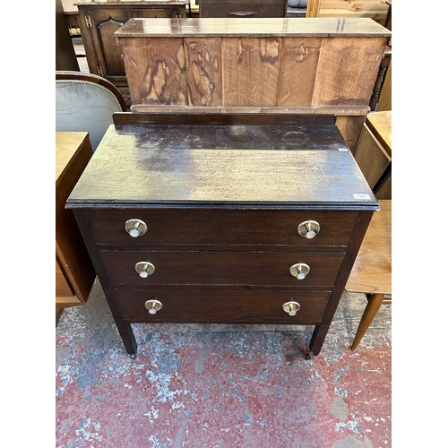 110 - An oak chest of drawers - approx. 81cm high x 74cm wide x 41cm deep