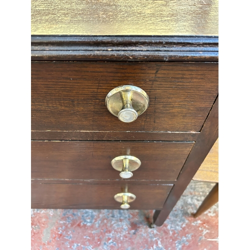 110 - An oak chest of drawers - approx. 81cm high x 74cm wide x 41cm deep