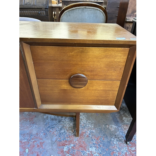 111 - A mid 20th century teak sideboard - approx. 73.5cm high x 181cm wide x 40cm deep