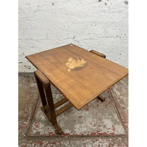 112 - A 1930s inlaid oak tilt top occasional table - approx. 46cm high when tilted x 52cm wide x 61cm long