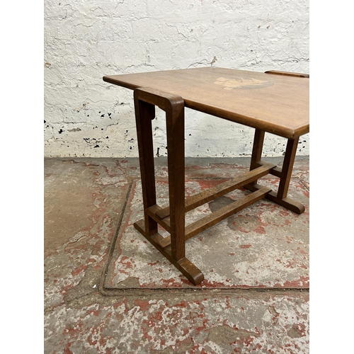 112 - A 1930s inlaid oak tilt top occasional table - approx. 46cm high when tilted x 52cm wide x 61cm long