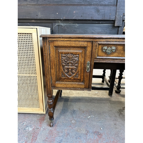 117 - A late 19th century carved oak and green leather writing desk - approx. 77cm high x 118cm wide x 54c... 