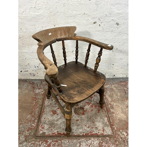 12 - A Victorian elm and beech smoker's bow chair