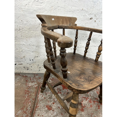 12 - A Victorian elm and beech smoker's bow chair