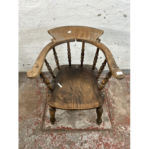 12 - A Victorian elm and beech smoker's bow chair