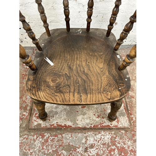 12 - A Victorian elm and beech smoker's bow chair