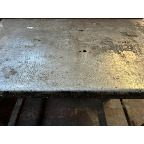 131 - A mid 20th century steel industrial table - approx. 69cm high x 46cm wide x 76cm long